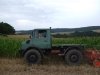 Unimog mit Howard Fräse